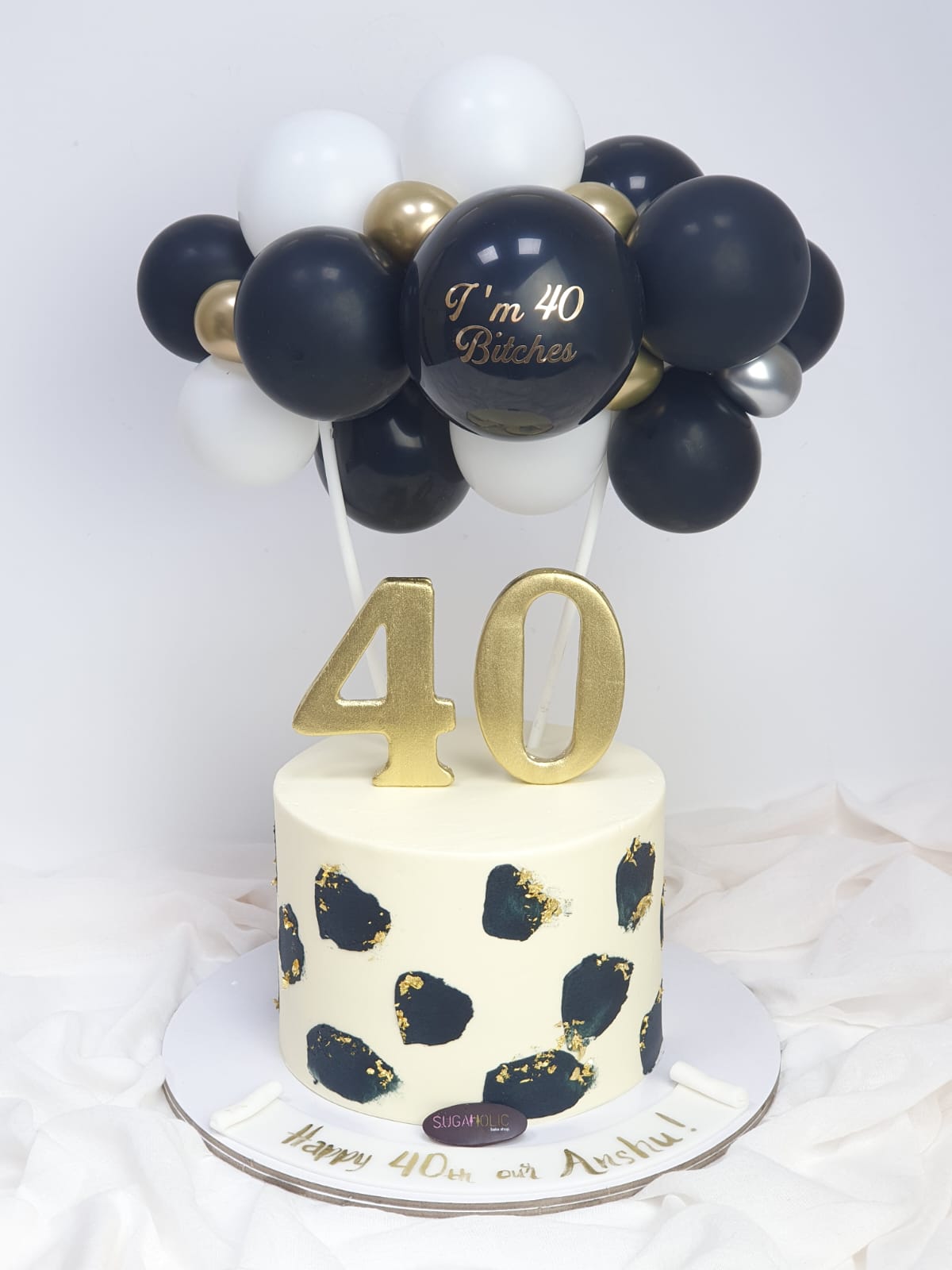 Age Black and Gold Buttercream Cake 