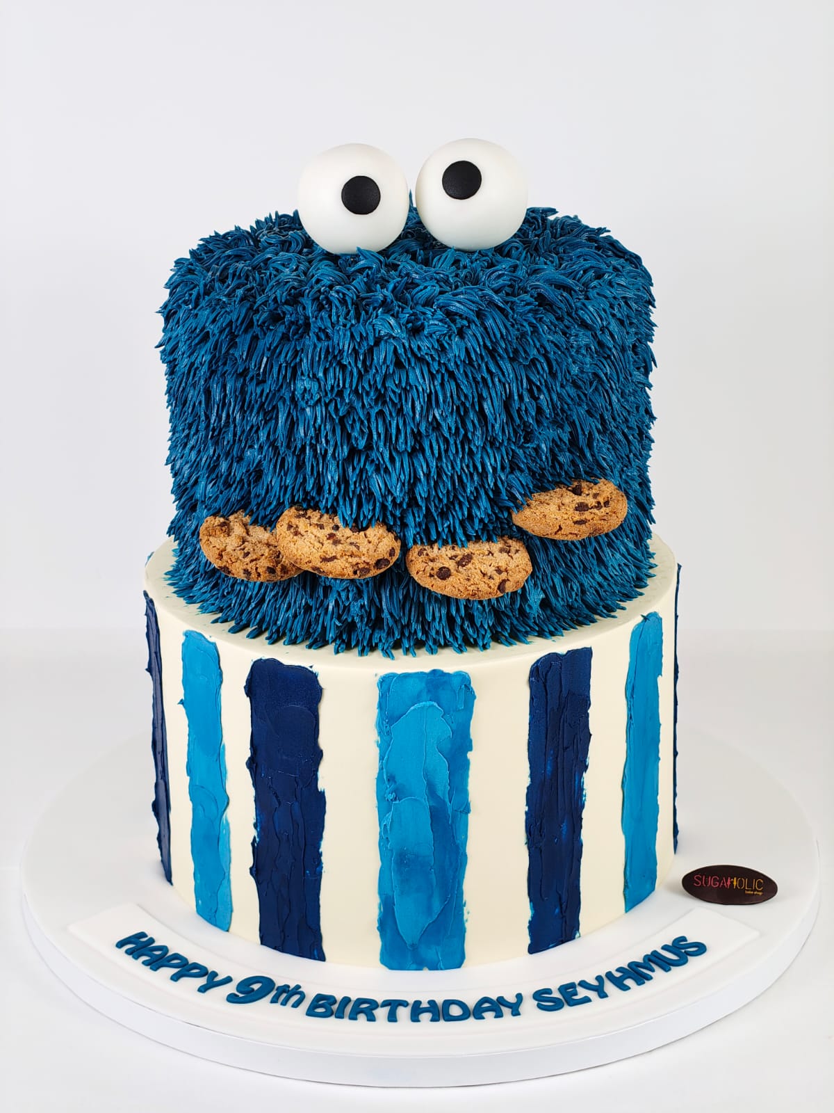 Blue Cookie Character Two Tier Buttercream Cake