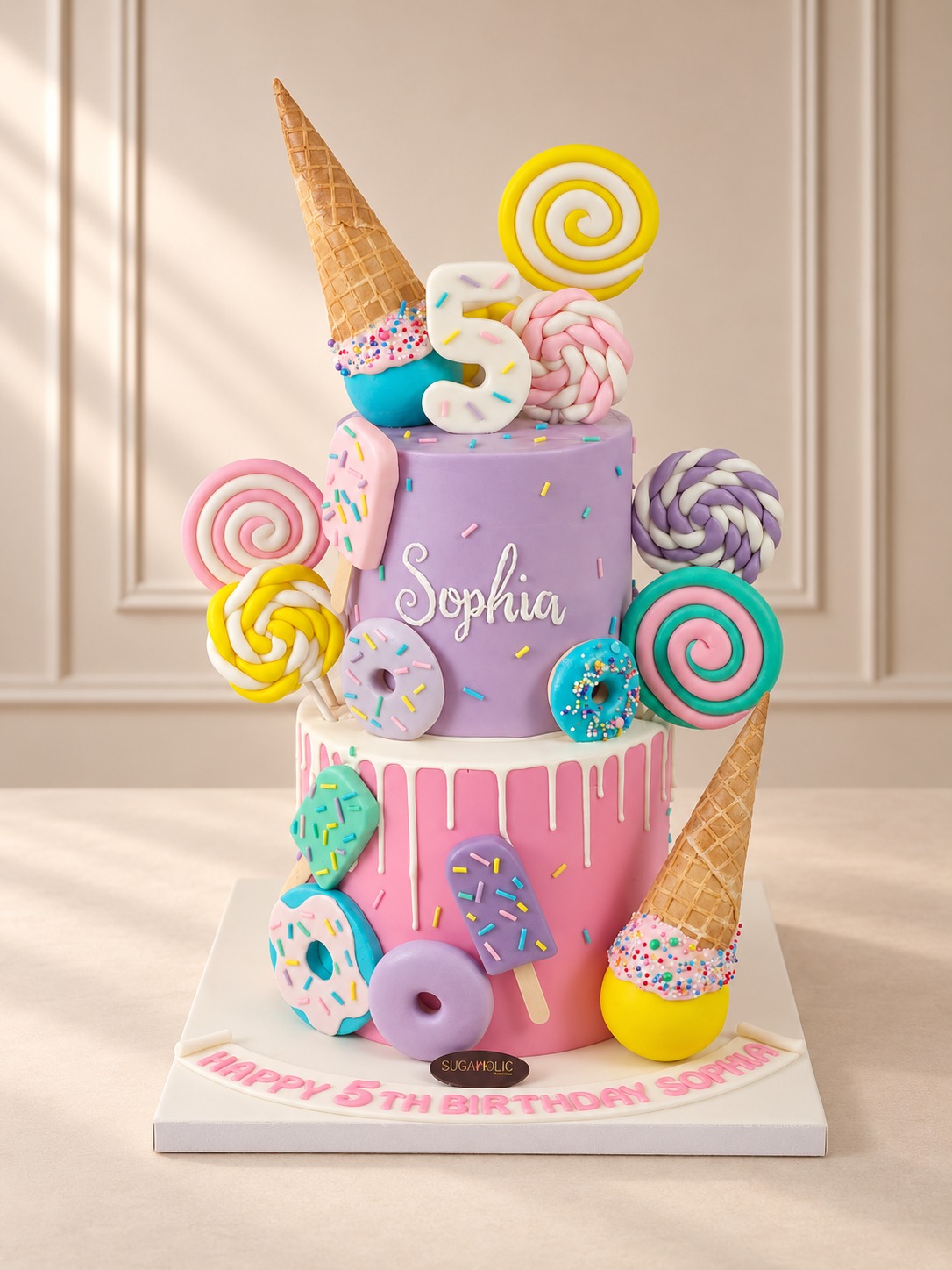 Candy Land Two Tier Cake with Cones and Lollipops