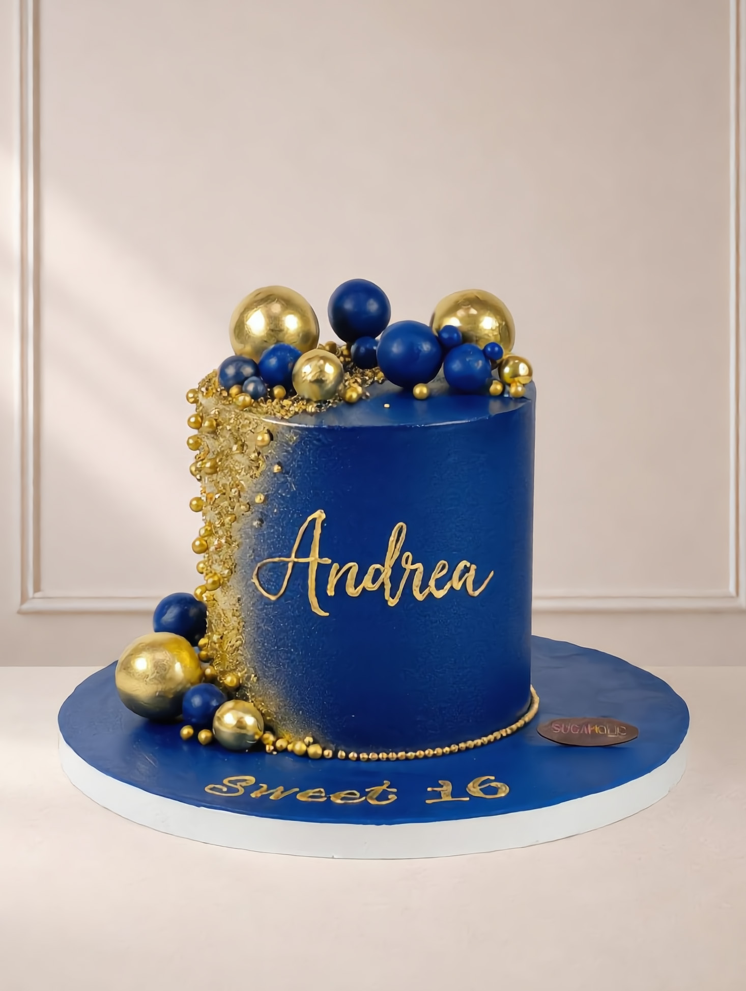Royal Blue and Gold Sphere Buttercream Cake